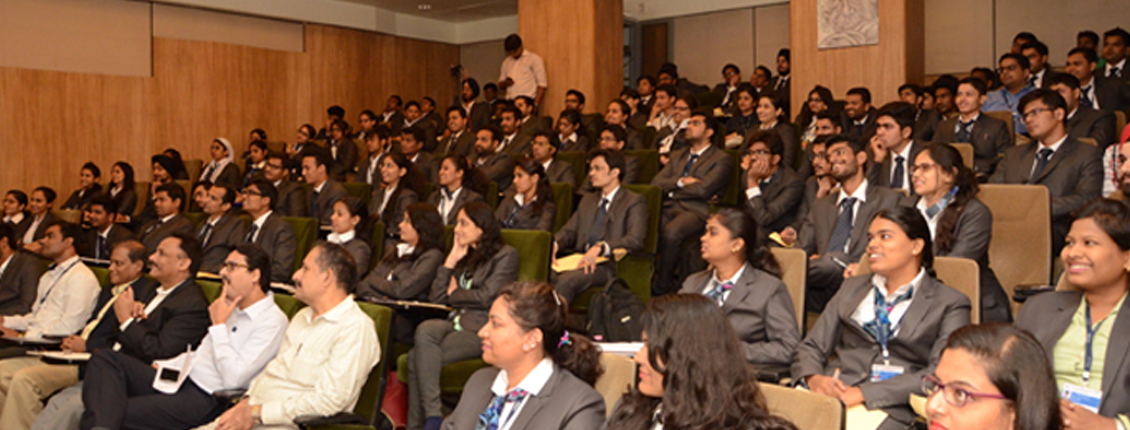 Management students learn how to manage their money and invest smartly